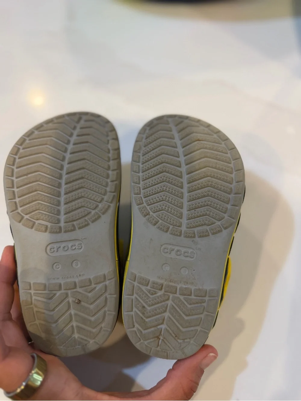CROCS Kids Gray Clogs with Yellow Heel Strap